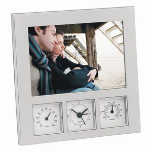 Fotolijst voor fotoÂ´s van 10 x 15 cm met analoog alarmklokje, thermometer en hygrometer, zilver